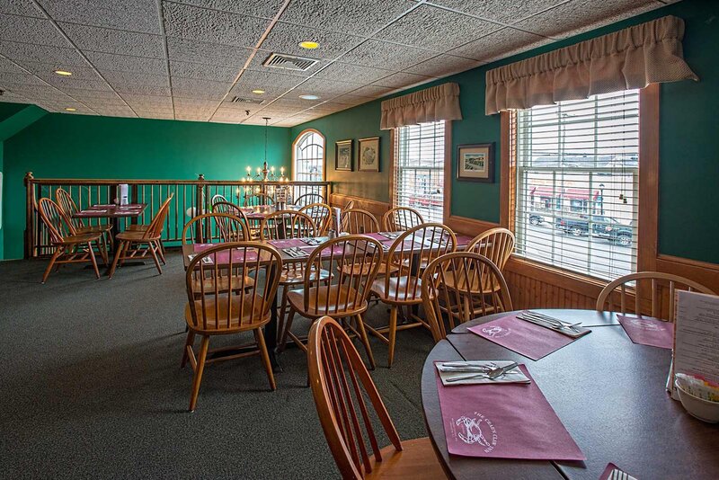 Upstairs seating with set tables