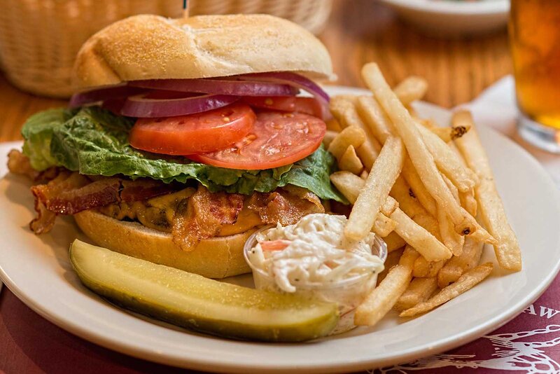 Bacon Cheeseburger with a side of coleslaw and french fries